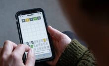 A close-up of someone playing Wordle on a smartphone.